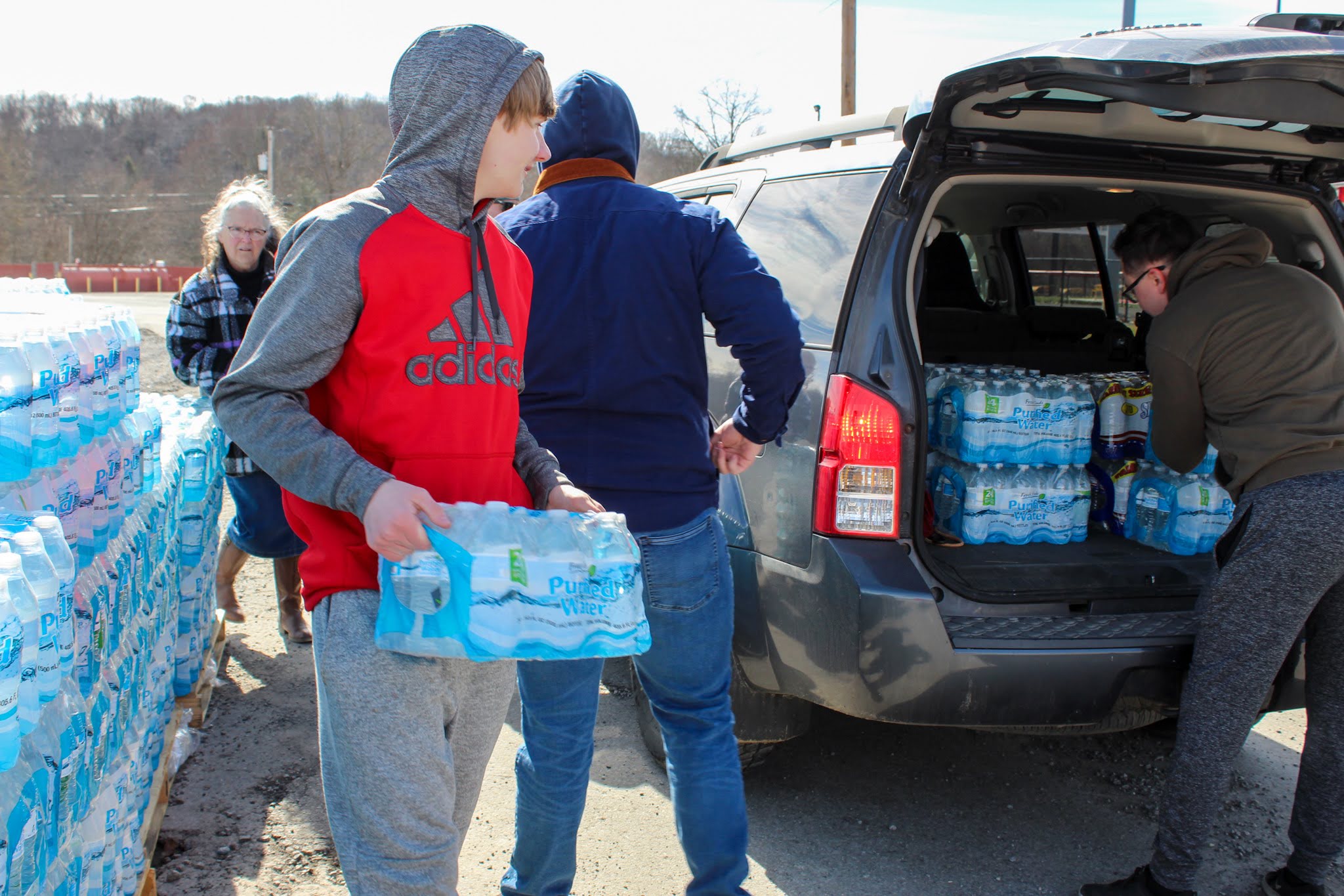 Volunteers work to distribute bottled water to residents of East Palestine. These efforts were supported by Feed the Children and Niagara Bottling.